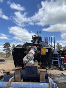 HDD rig setting up on a horizontal well location at a coal ash impoundment